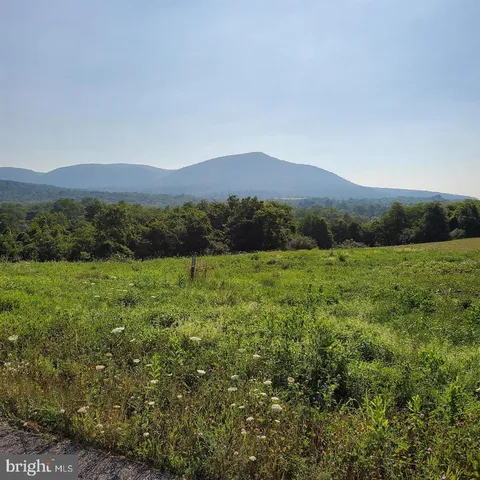 a view of an outdoor space and a mountain view