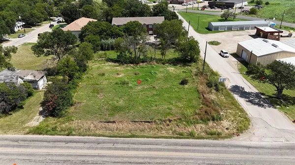 an aerial view of residential house with outdoor space