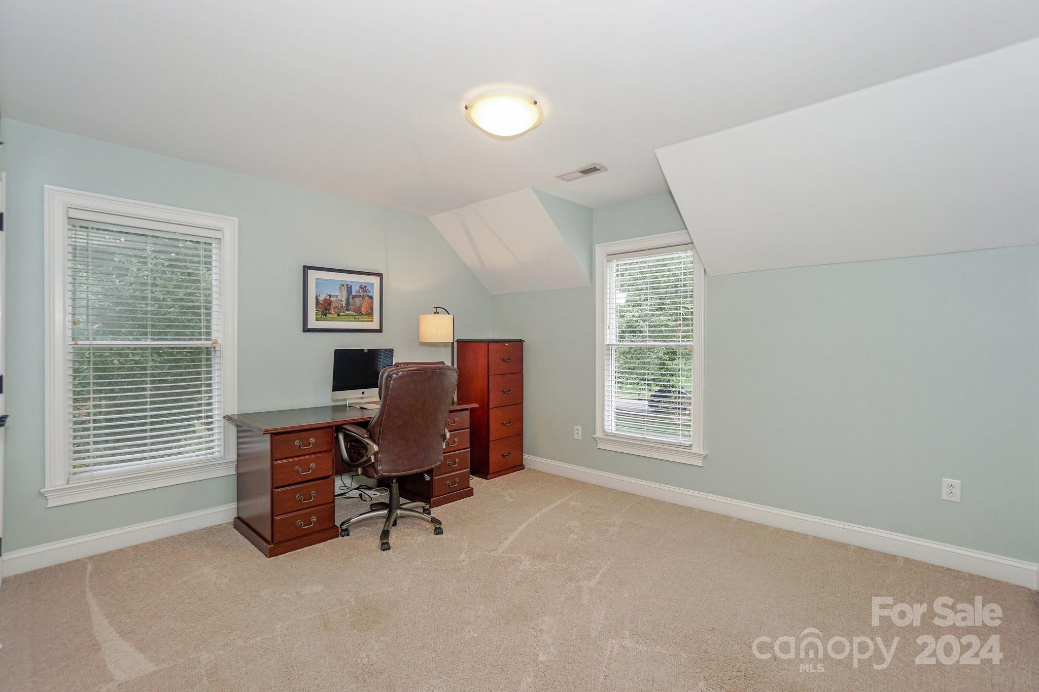21910 Satilla Drive Cornelius, NC 28031 - Photo 31 of 47 a view of a workspace with furniture and a window