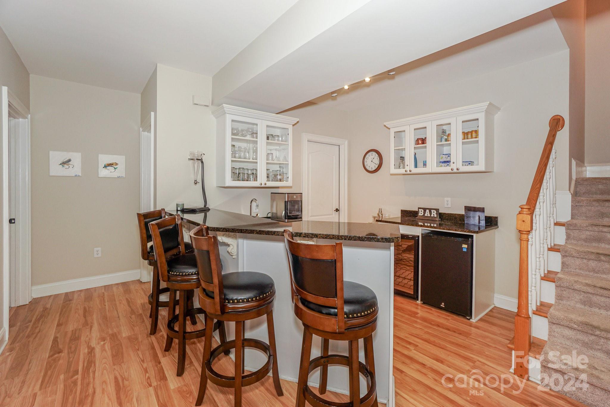 21910 Satilla Drive Cornelius, NC 28031 - Photo 38 of 47 a dining room with furniture and wooden floor