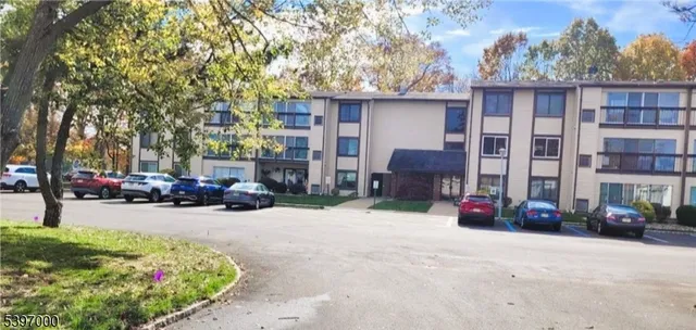 a view of a street with cars