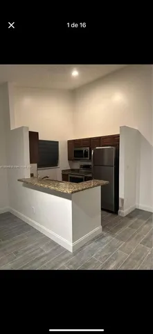 a view of kitchen appliances