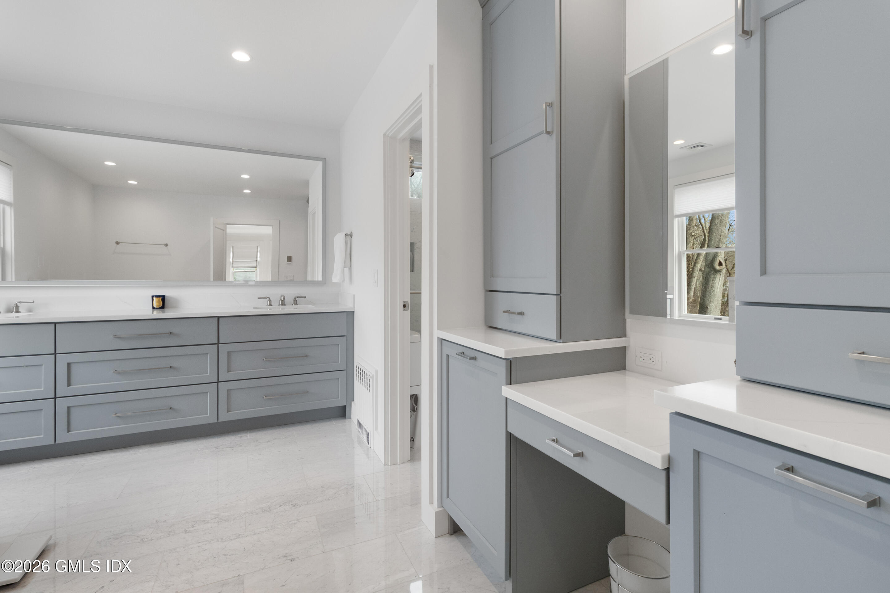 29 Weston Hill Road Riverside, CT 06878 - Photo 14 of 23 a bathroom with a sink and a mirror