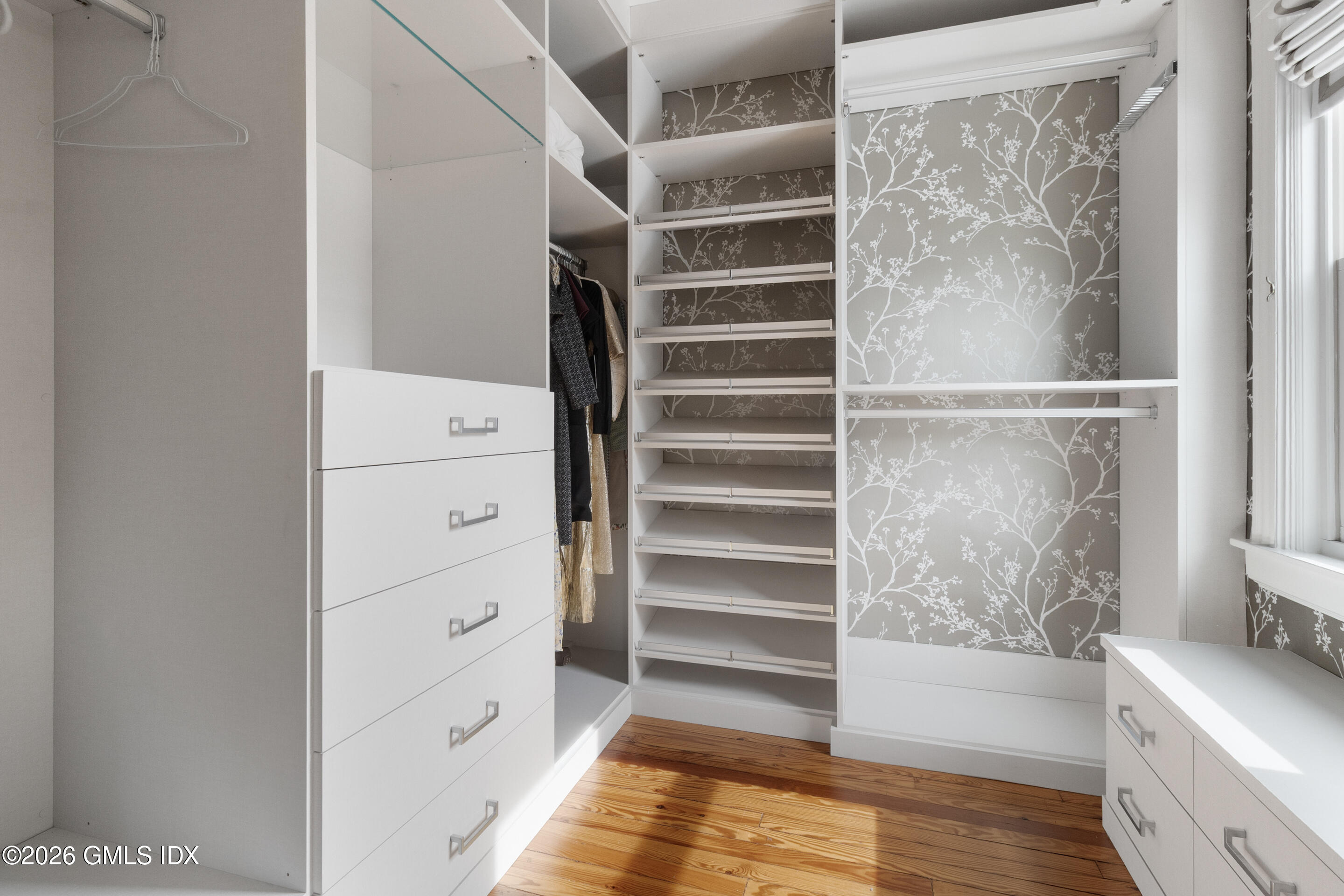 29 Weston Hill Road Riverside, CT 06878 - Photo 16 of 23 a view of walk in closet and bedroom