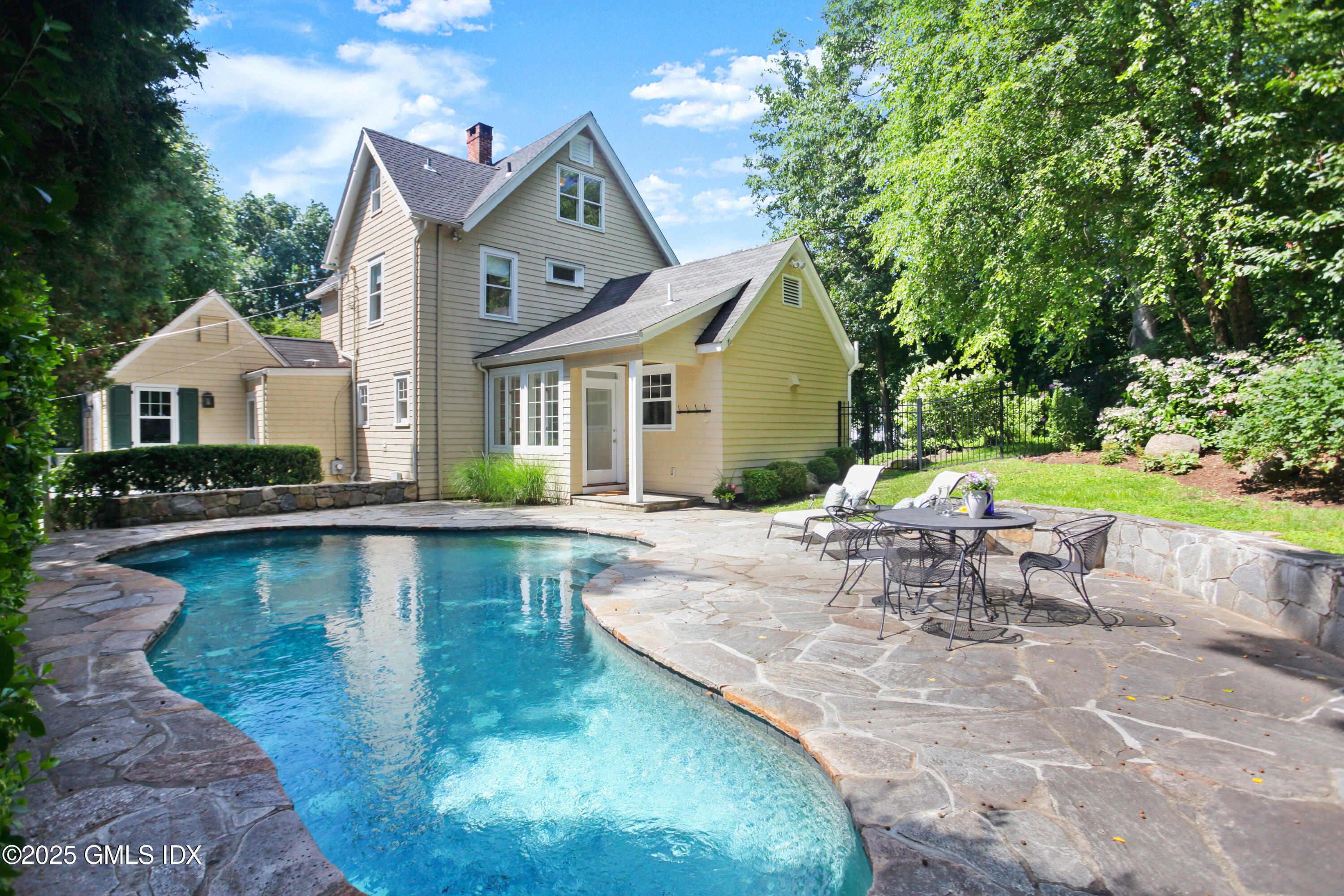 29 Weston Hill Road Riverside, CT 06878 - Photo 23 of 23 an aerial view of a house with swimming pool garden and patio
