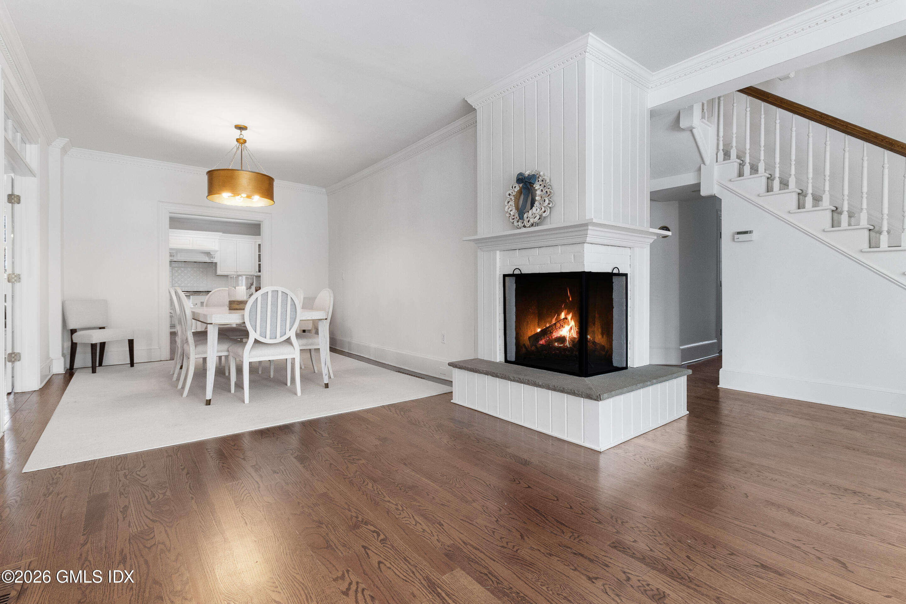 29 Weston Hill Road Riverside, CT 06878 - Photo 7 of 23 a living room with furniture and a fireplace