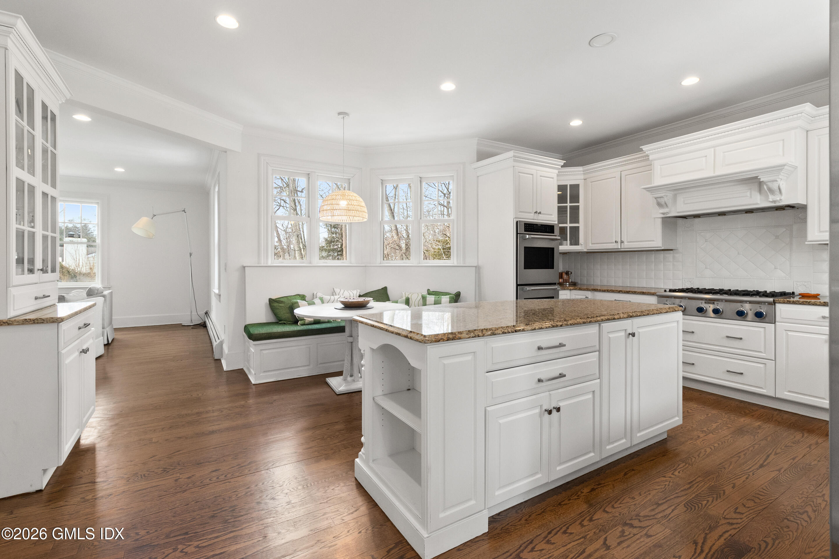 29 Weston Hill Road Riverside, CT 06878 - Photo 9 of 23 a kitchen with white cabinets and white appliances