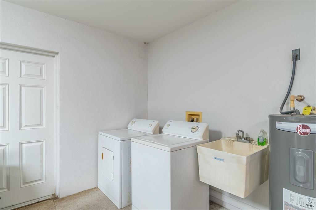 30 Milky Way Venus, FL 33960 - Photo 27 of 47 a utility room with dryer and washer