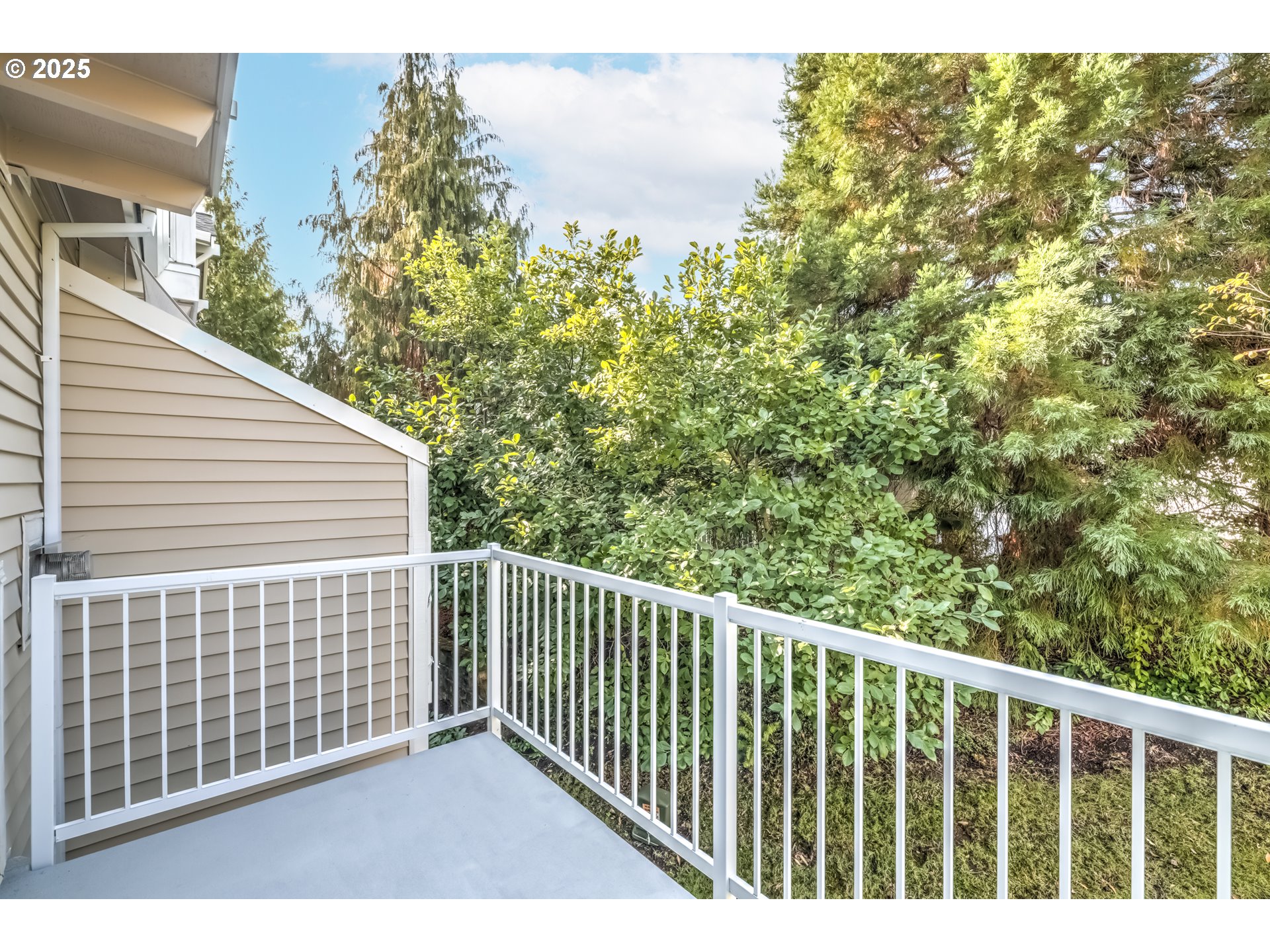 16080 Southwest Audubon Street, Unit 103 Beaverton, OR 97003 - Photo 22 of 24 a view of a balcony with outside space