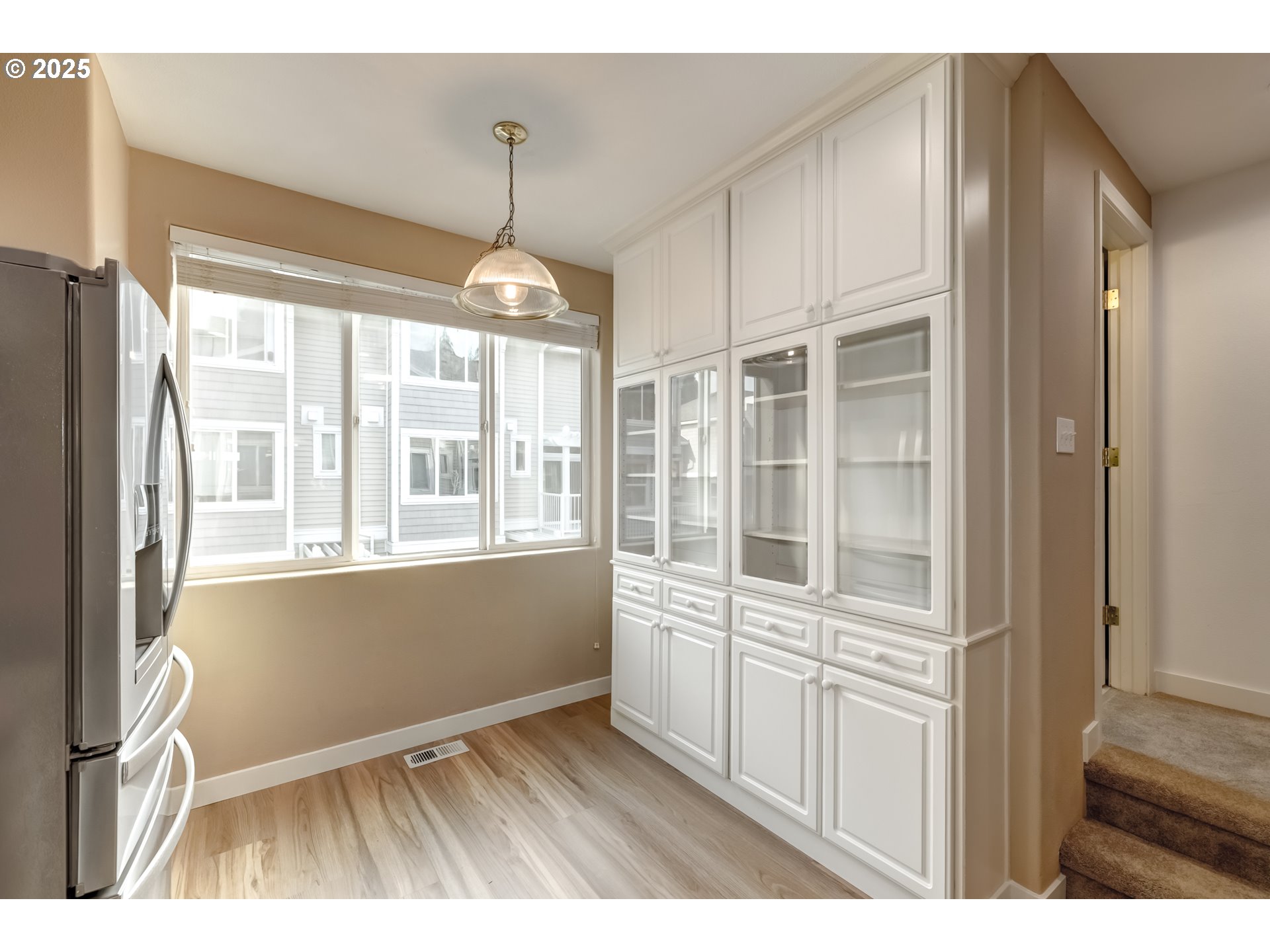 16080 Southwest Audubon Street, Unit 103 Beaverton, OR 97003 - Photo 10 of 24 a view of an empty room with a window