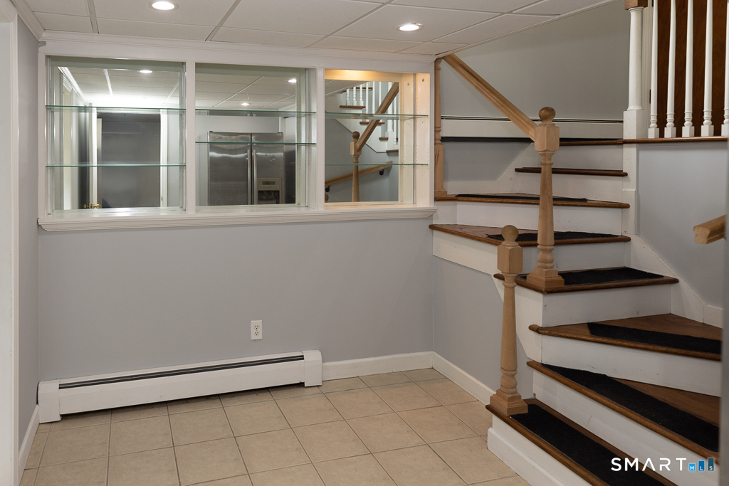 49 Kelseytown Road Clinton, CT 06413 - Photo 28 of 40 Down the stairs to the finished lower level