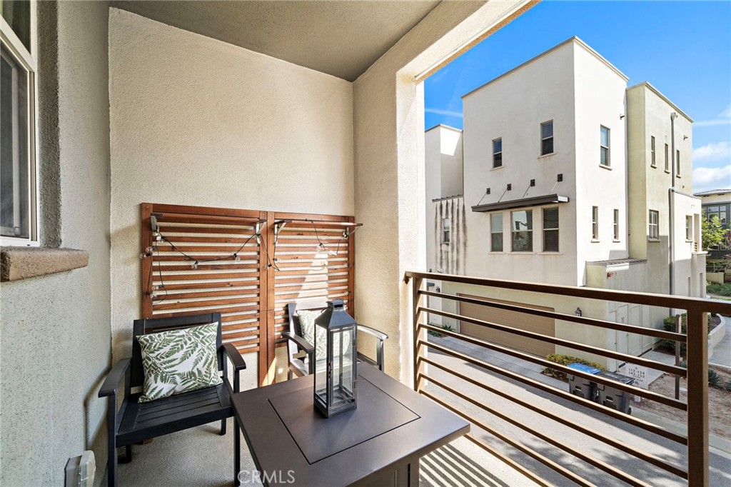144 Paramount Irvine, CA 92618 - Photo 7 of 43 a view of a balcony with chairs