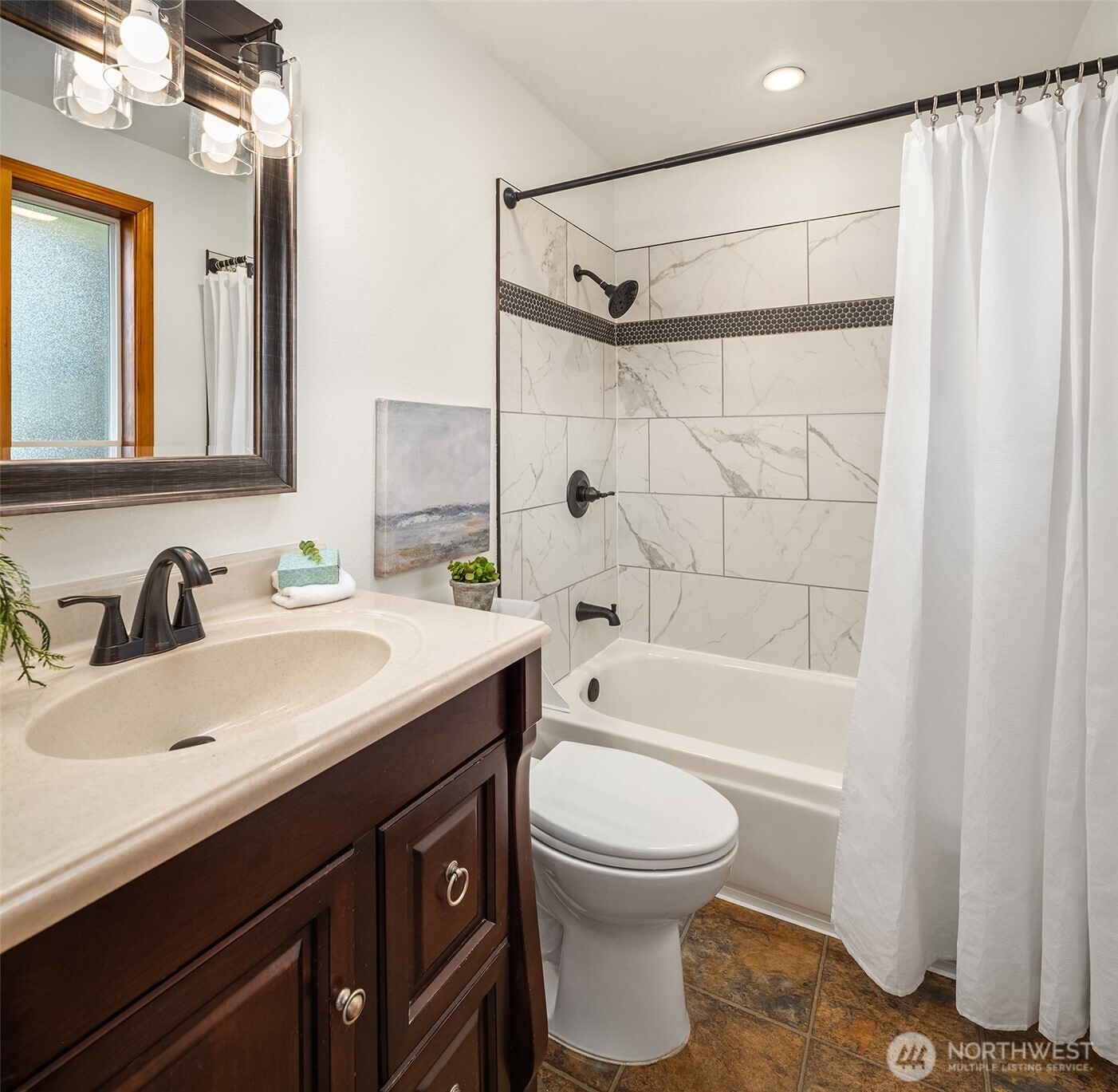 14410 48th Place West Edmonds, WA 98026 - Photo 11 of 24 a bathroom with a sink a toilet and shower