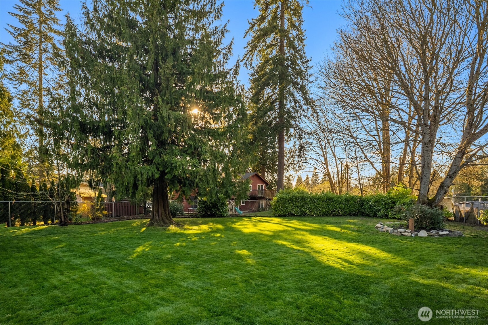 14410 48th Place West Edmonds, WA 98026 - Photo 3 of 24 a swimming pool with outdoor seating and yard