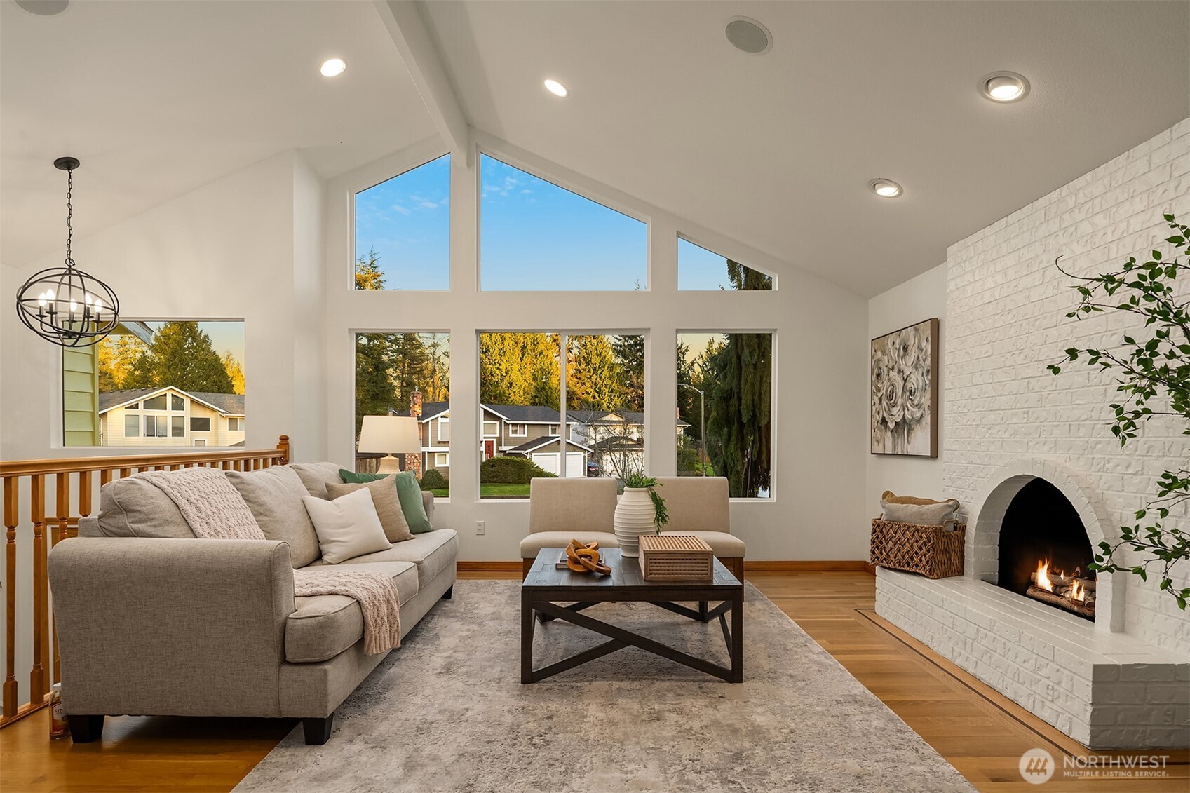 14410 48th Place West Edmonds, WA 98026 - Photo 4 of 24 a living room with furniture fireplace and window