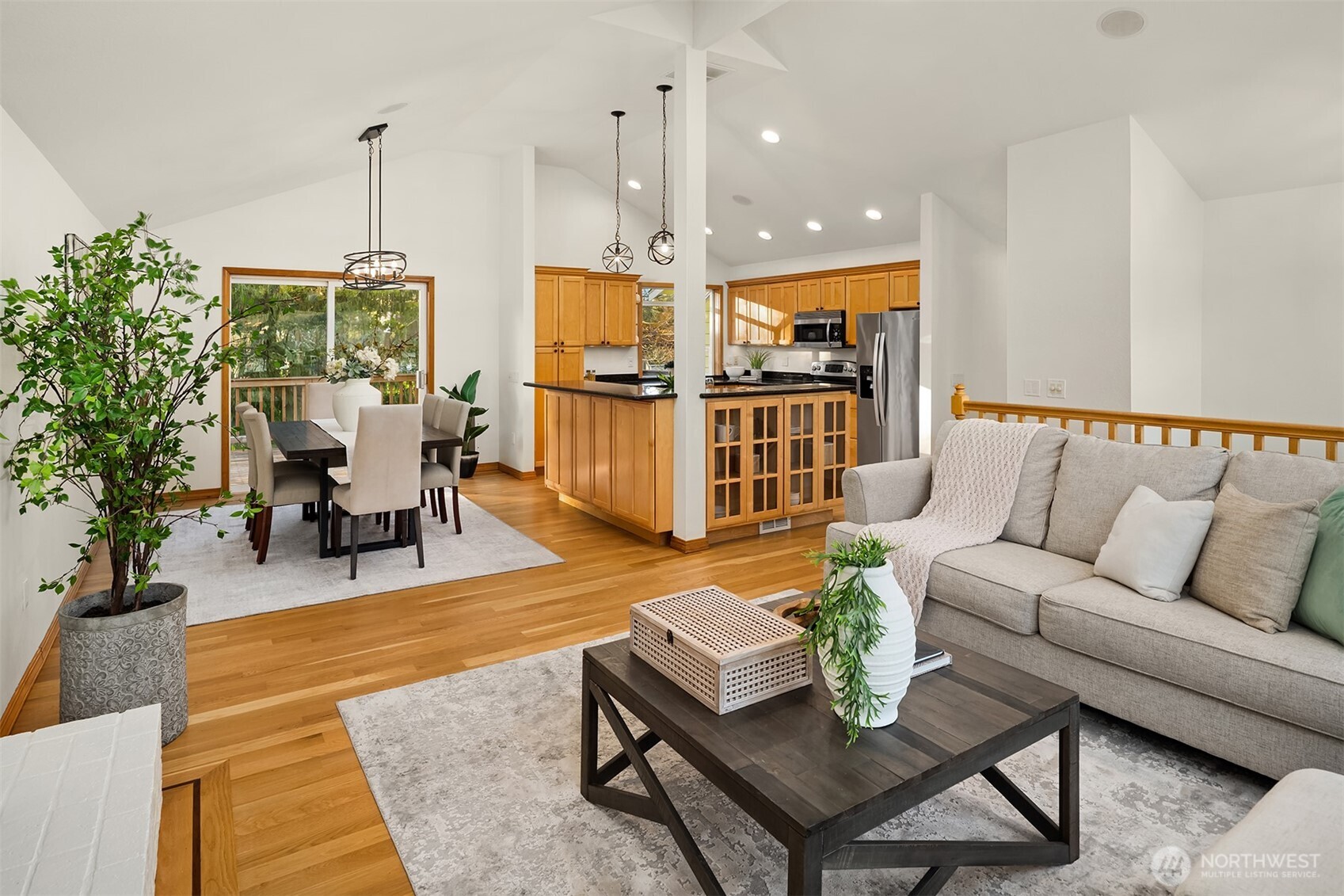 14410 48th Place West Edmonds, WA 98026 - Photo 5 of 24 a living room with furniture kitchen view and a chandelier