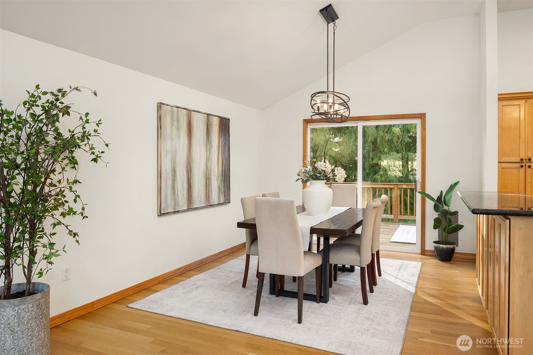 14410 48th Place West Edmonds, WA 98026 - Photo 6 of 24 a dining room with furniture window entryway and wooden floor