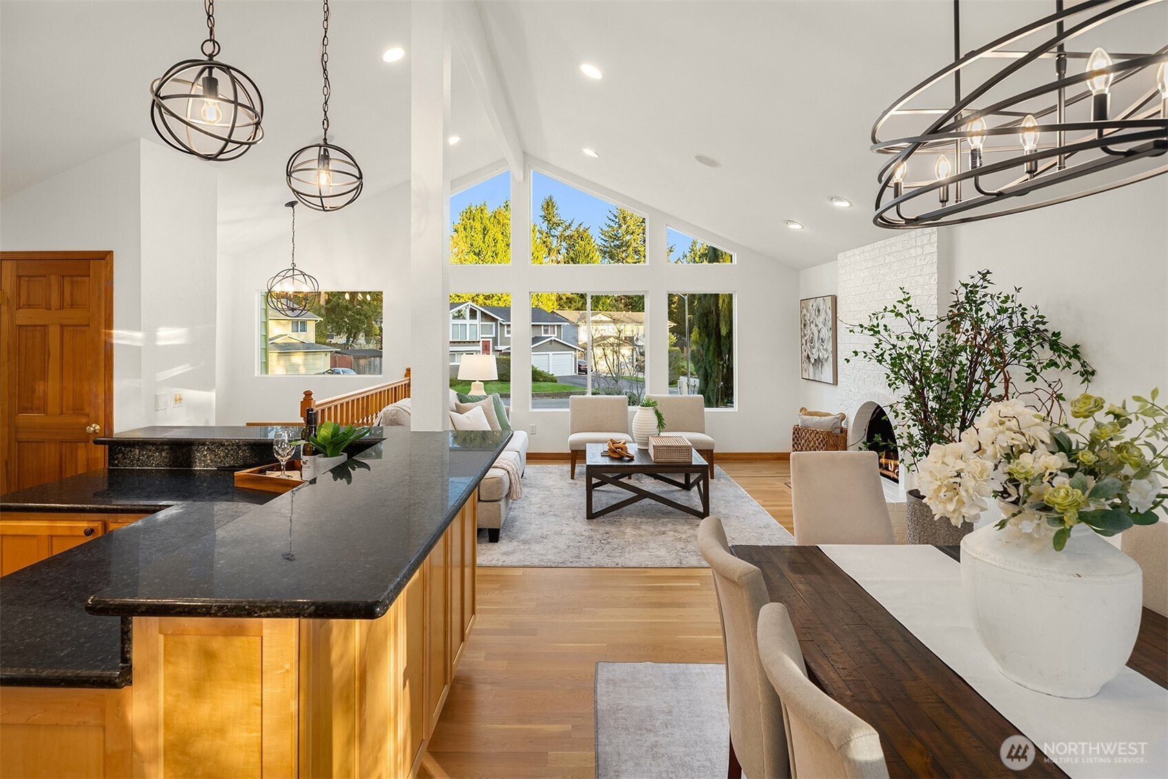 14410 48th Place West Edmonds, WA 98026 - Photo 7 of 24 a living room with furniture kitchen view and a large window
