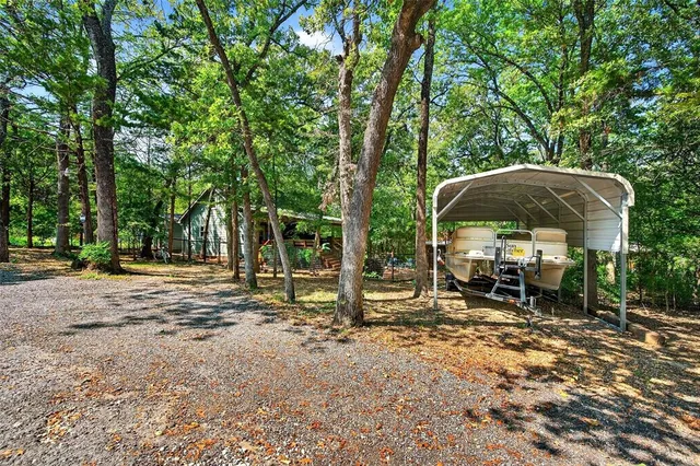 a view of backyard with trees