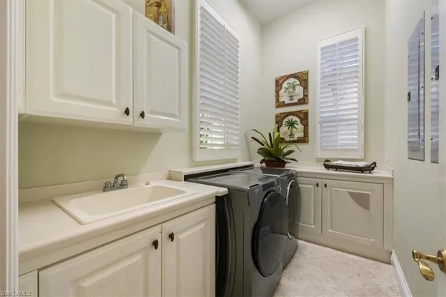 a bathroom with a sink a vanity and a mirror