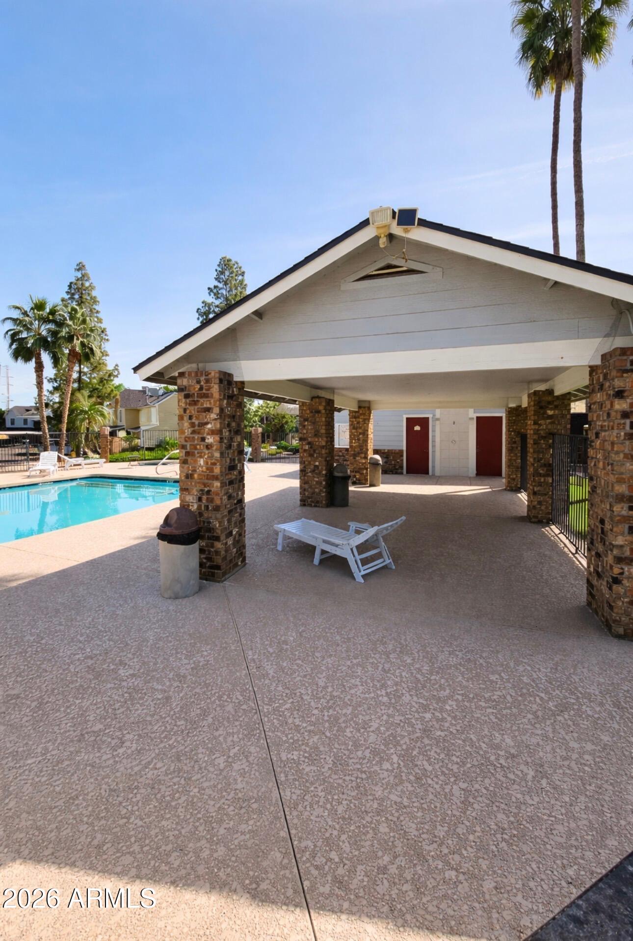 4835 East McNeil Street, Unit 2 Phoenix, AZ 85044 - Photo 16 of 21 a view of a house with a patio