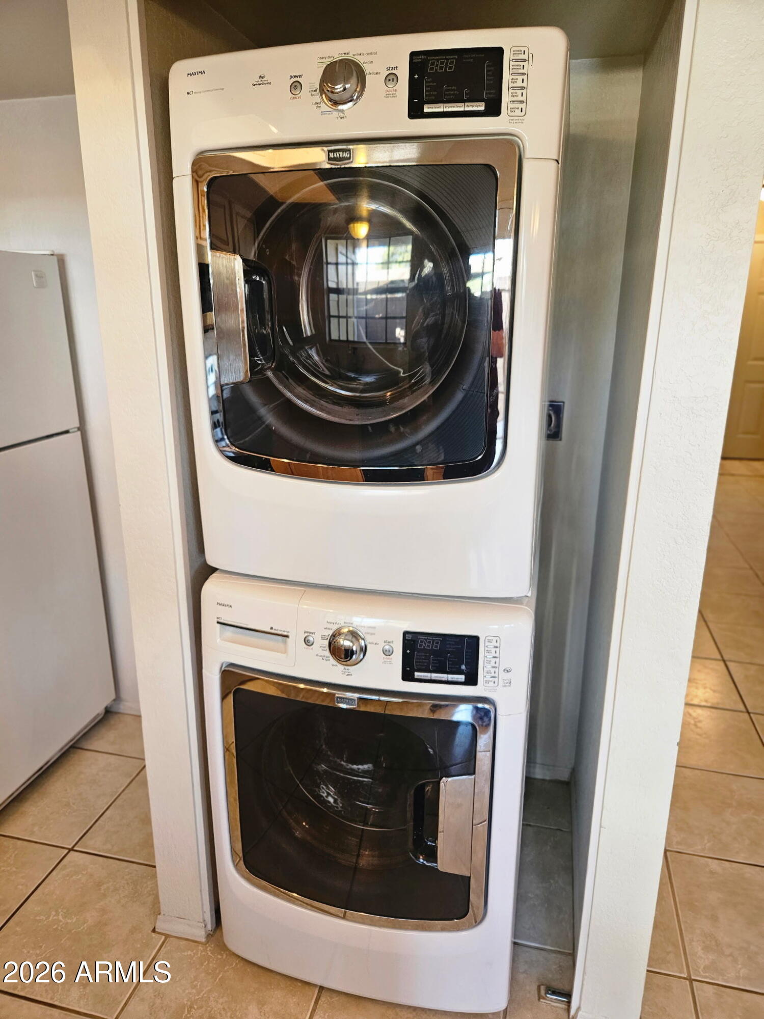 4835 East McNeil Street, Unit 2 Phoenix, AZ 85044 - Photo 5 of 21 a close up view of washer and dryer
