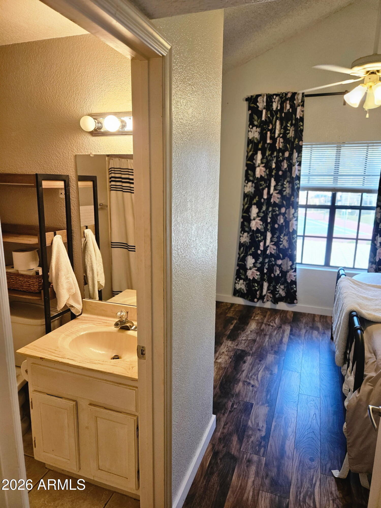 4835 East McNeil Street, Unit 2 Phoenix, AZ 85044 - Photo 10 of 21 a storage room with wooden floor washer and dryer
