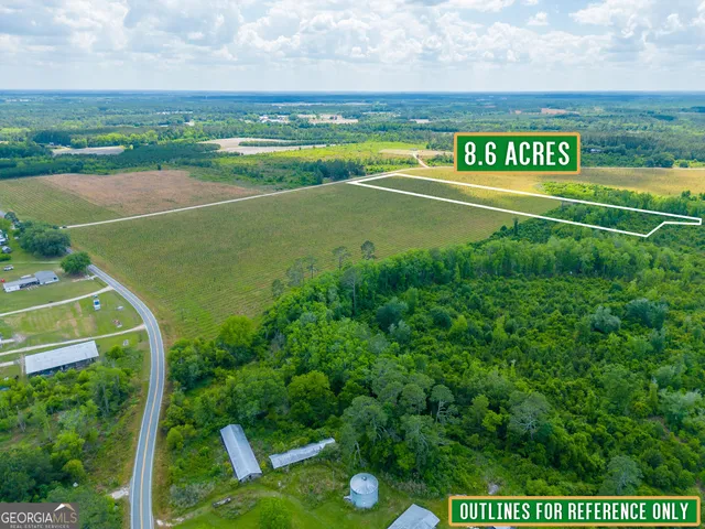 a view of an outdoor space and basketball court