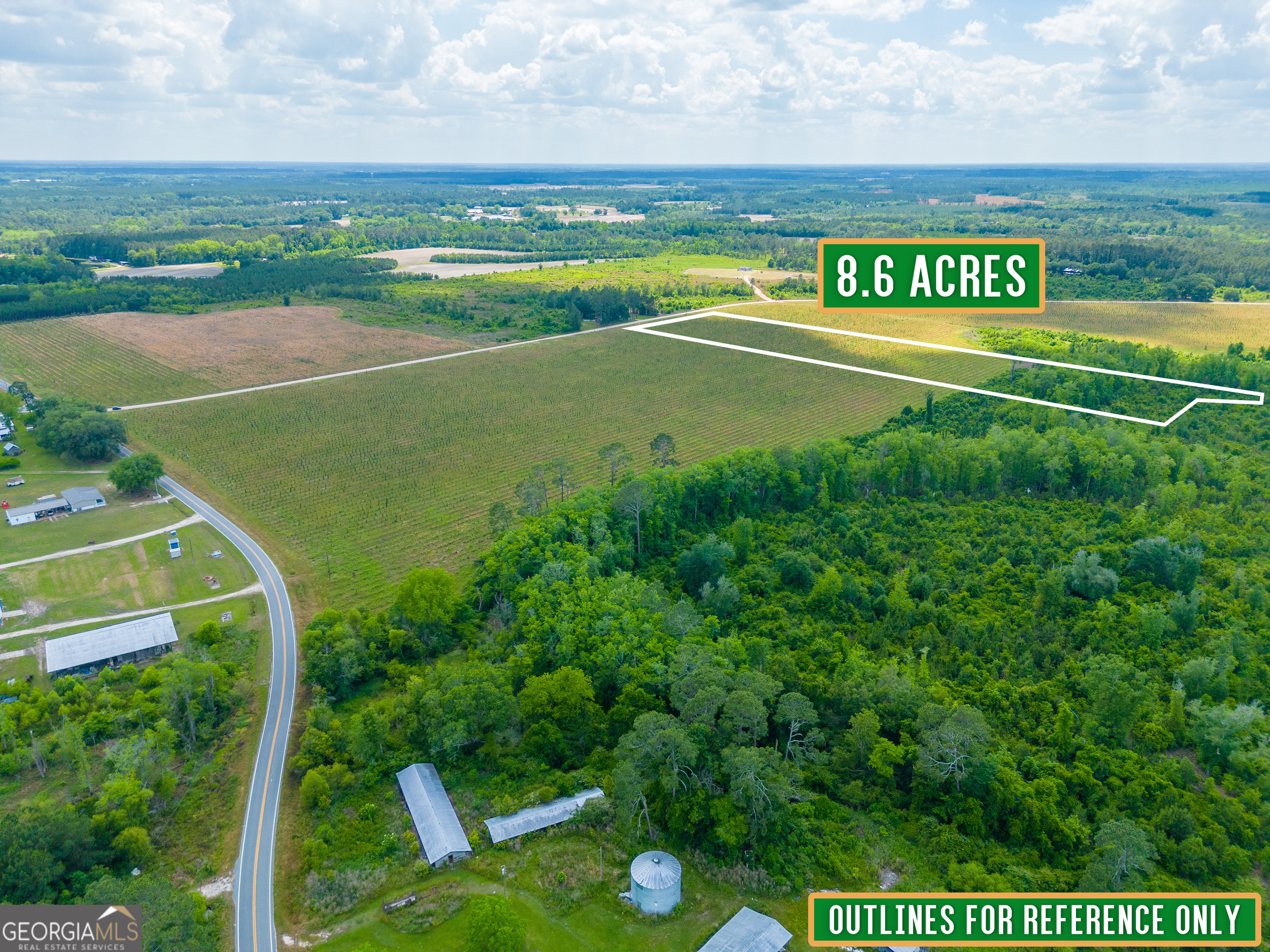 9 Sellers Road Northwest Baxley, GA 31513 - Photo 6 of 7 a view of a field with an ocean view