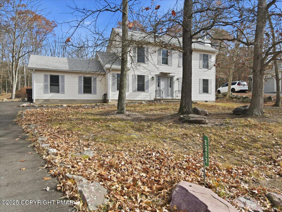 2312 Cramer Court Bushkill, PA 18324 - Photo 101 of 107 a view of a house with a yard covered in snow