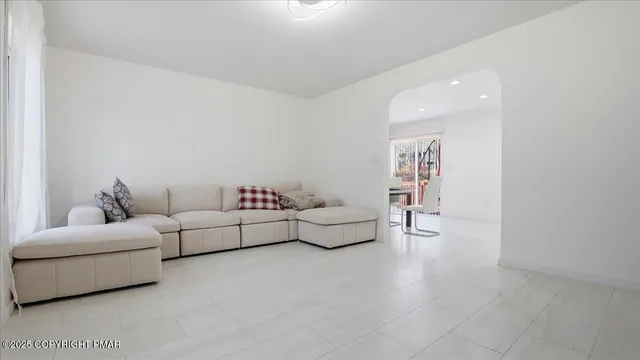 a kitchen with stainless steel appliances a sink stove and cabinets