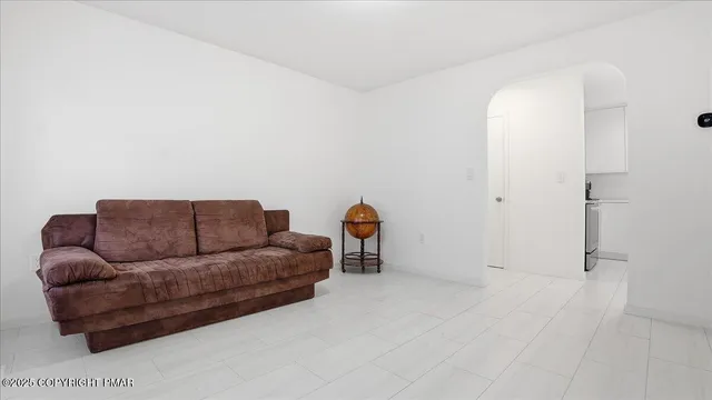 a kitchen with stainless steel appliances a refrigerator sink and cabinets