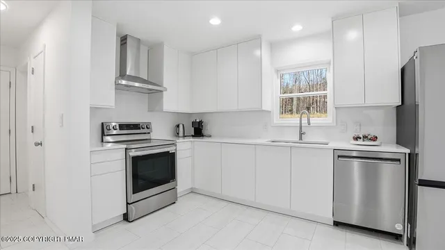 a spacious bedroom with a bed and a window