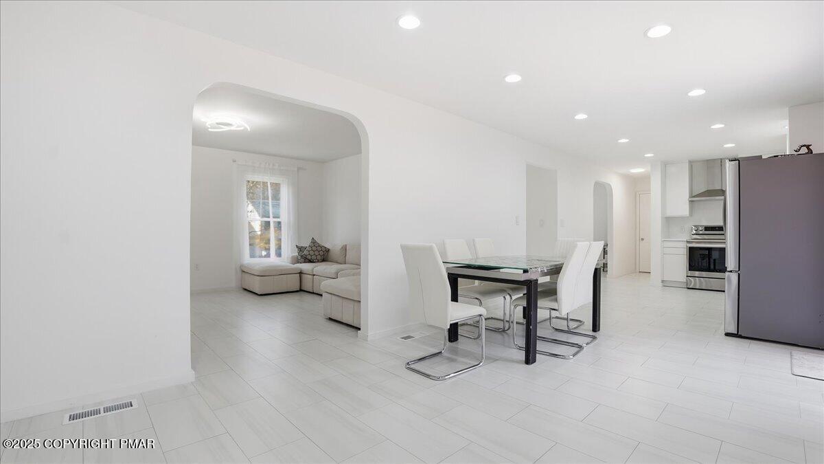 2312 Cramer Court Bushkill, PA 18324 - Photo 34 of 107 a view of a livingroom with furniture and a table