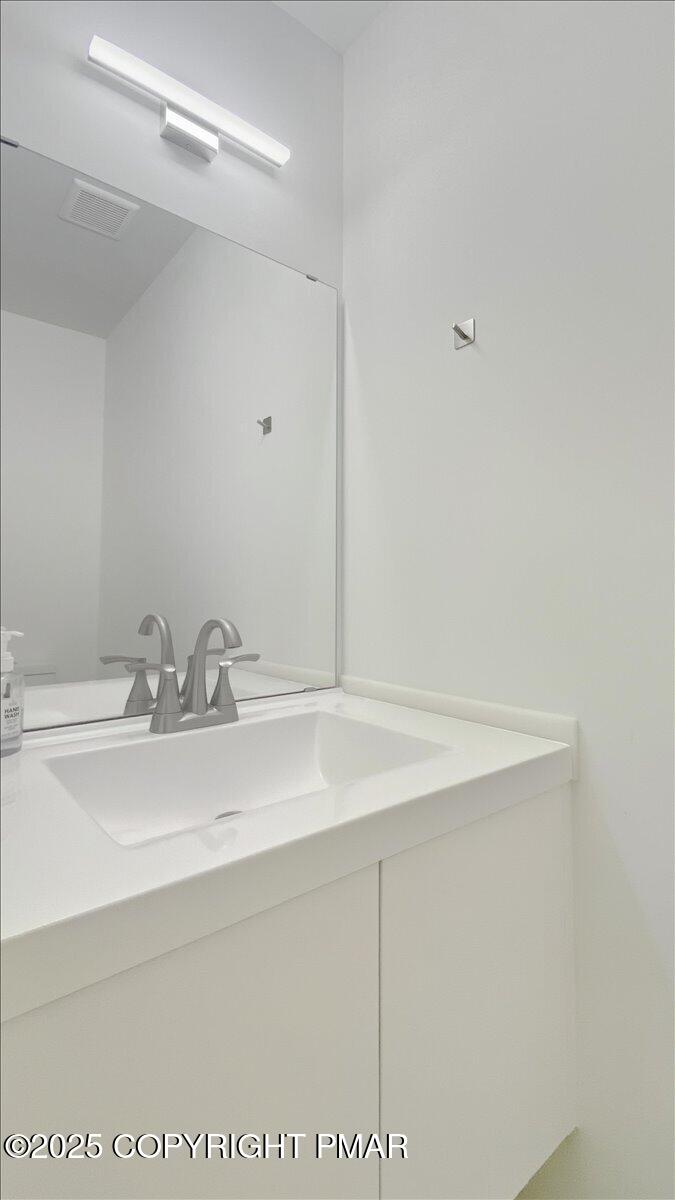 2312 Cramer Court Bushkill, PA 18324 - Photo 70 of 107 a bathroom with a sink and vanity