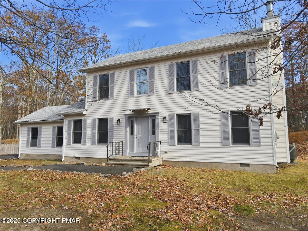 2312 Cramer Court Bushkill, PA 18324 - Photo 7 of 107 a front view of a house with a garden