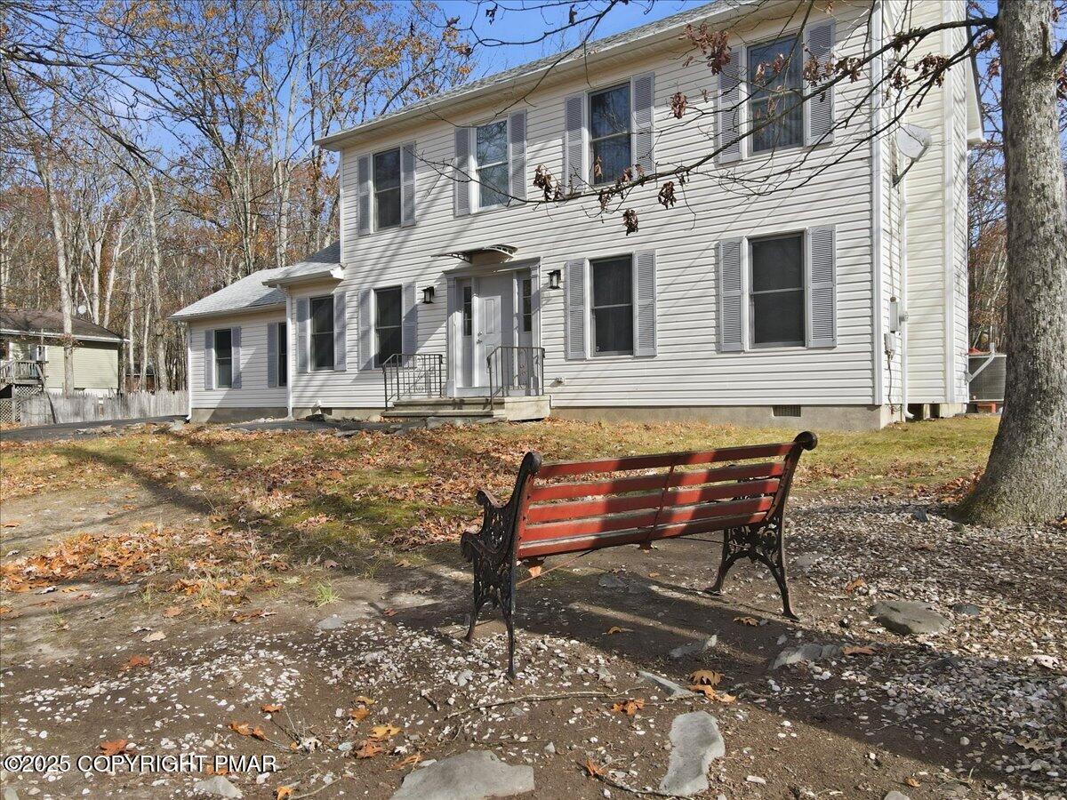 2312 Cramer Court Bushkill, PA 18324 - Photo 91 of 107 a backyard of a house with outdoor seating