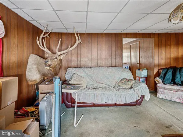 a bedroom with furniture and a bed