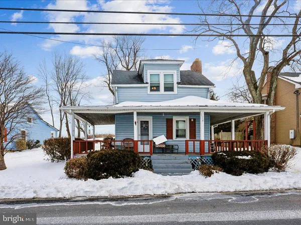 a view of a building with a yard
