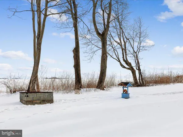 a view of snow on the side of road