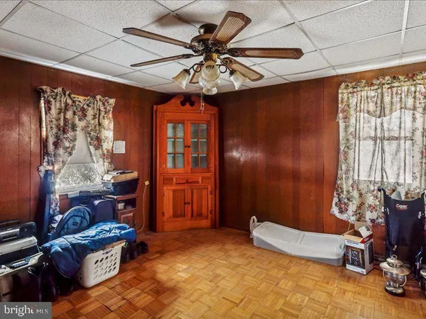 a bed room with a bed and a window