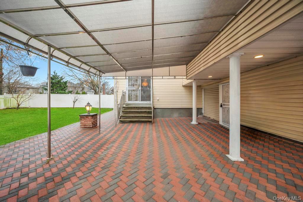 64 Fox Place Hicksville, NY 11801 - Photo 22 of 25 View of patio featuring entry steps