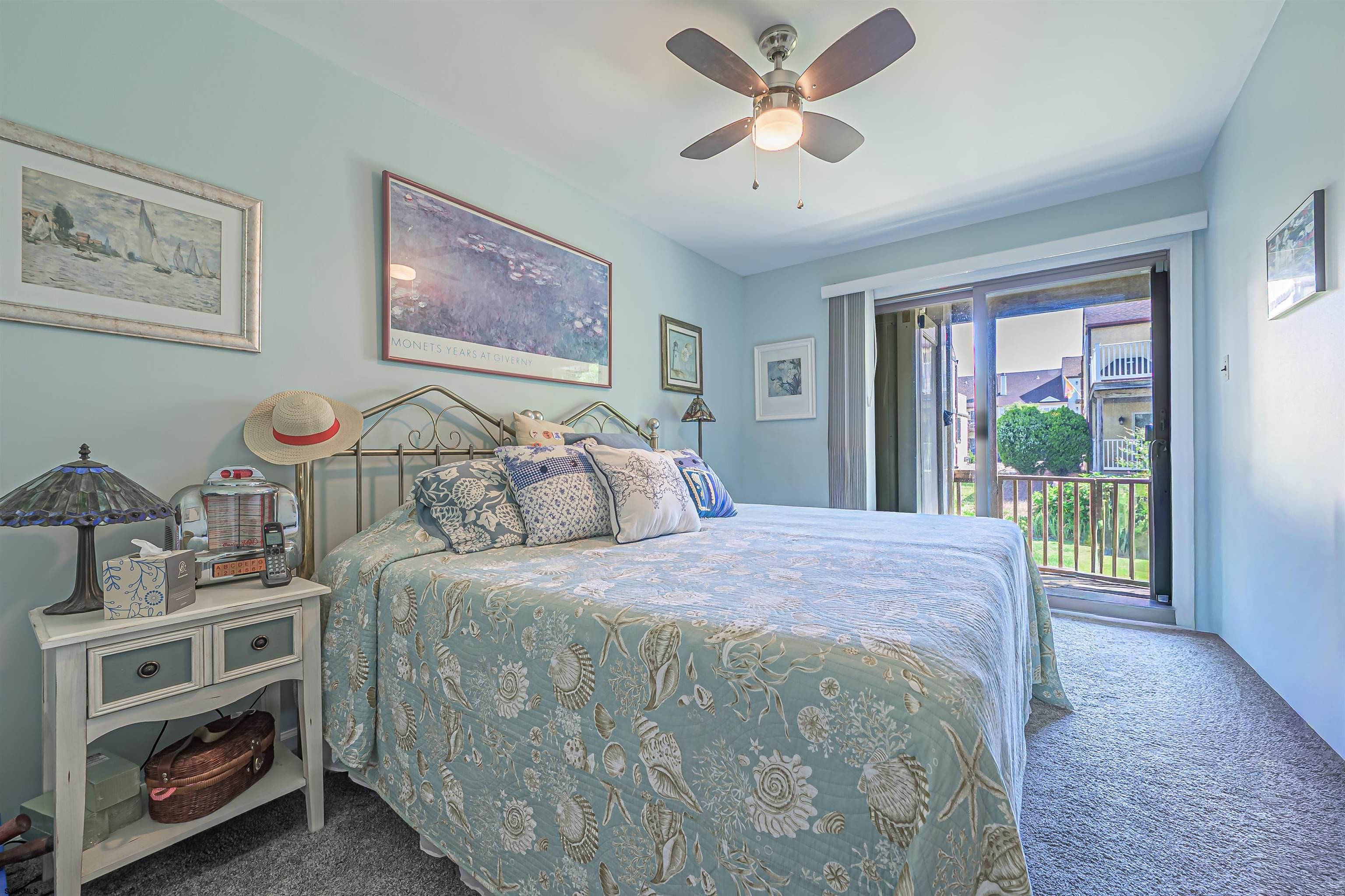 19 Bramble Drive Brigantine, NJ 08203 - Photo 12 of 15 a bedroom with a bed a dresser next to a window