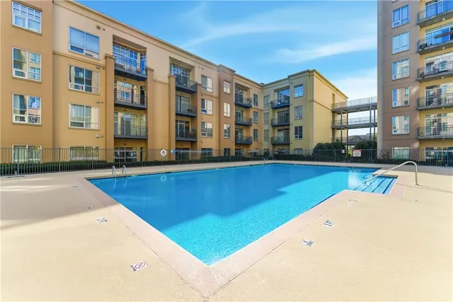 a view of a building with a swimming pool