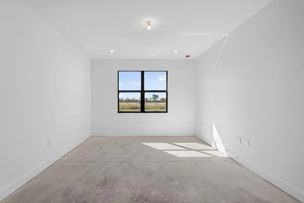 a view of a workspace with furniture