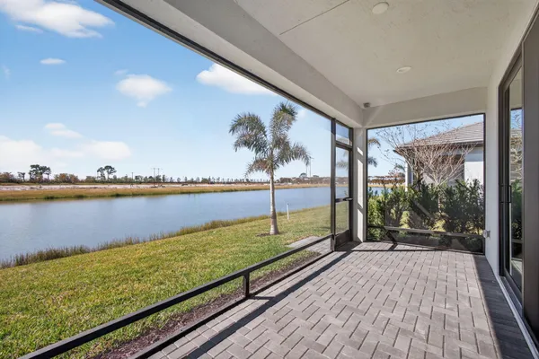 a view of a room with lots of counter space and a wooden floor
