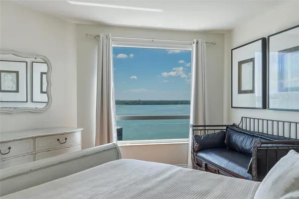 a bathroom with a double vanity sink and mirror