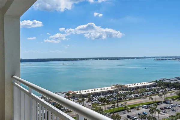 a view of a lake from a balcony
