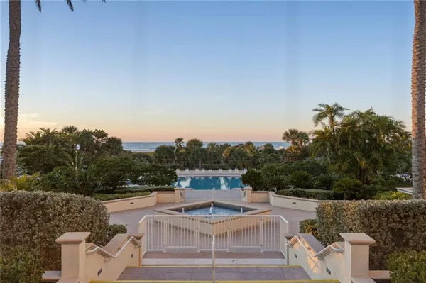 a bathroom with a shower and a glass door