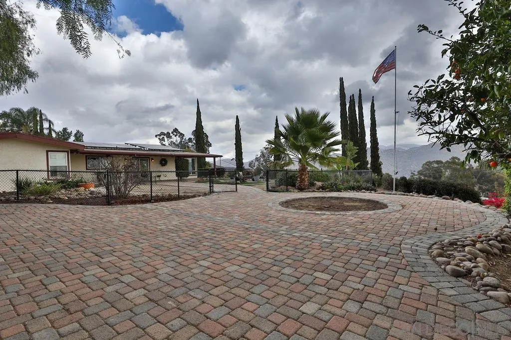 11836 Rocoso Road Lakeside, CA 92040 - Photo 34 of 65 a view of a yard in front of a house
